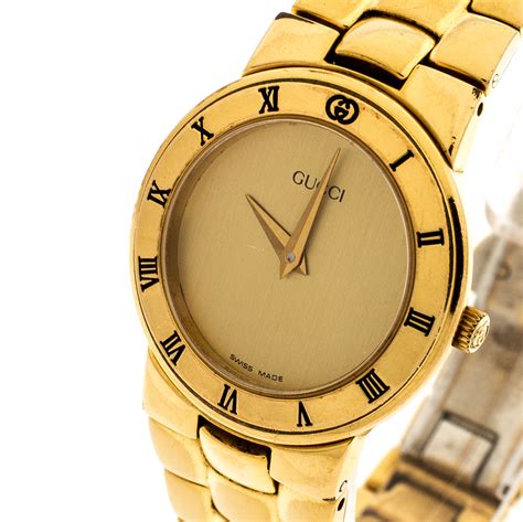 gucci gold watch ladies.